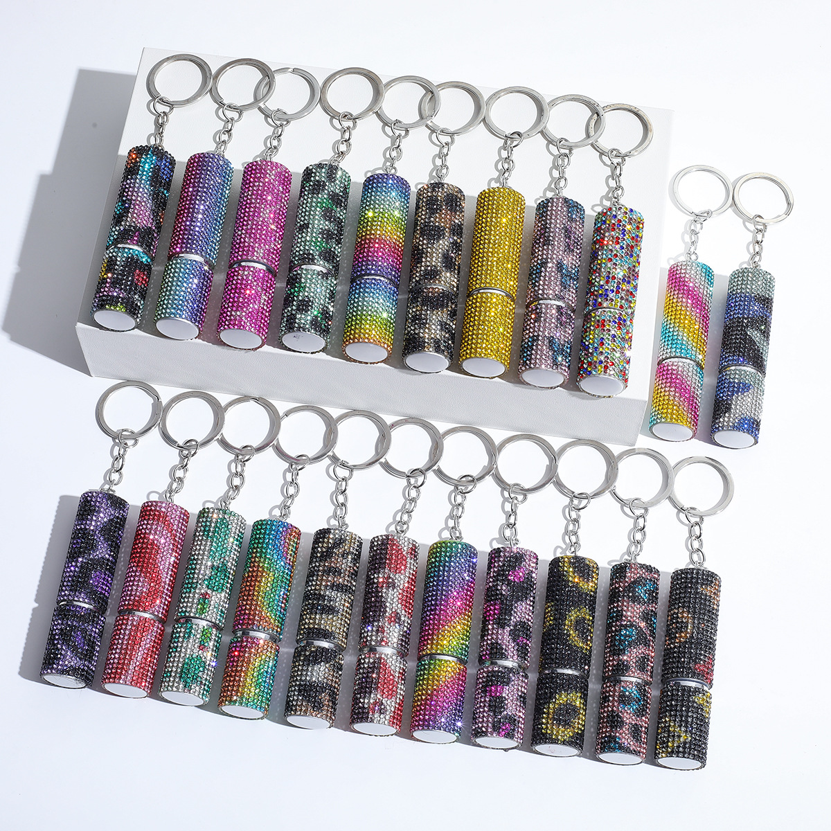 Multifunksionele draagbare mini 5ml parfuum of peper spaarbottel sleutelhanger